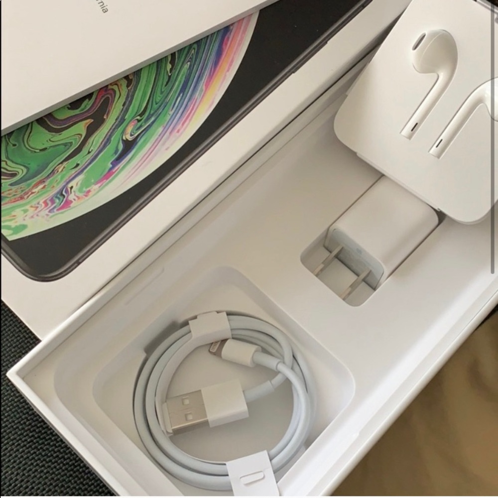 - Apple iPhone brand charge cord and wall plug